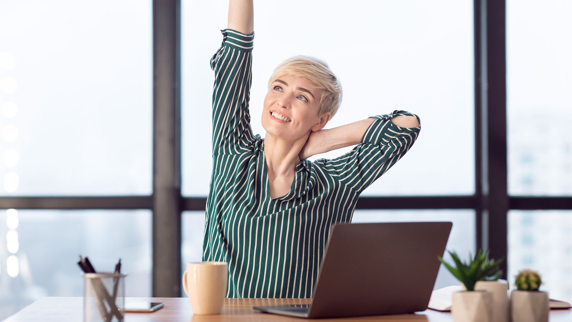 7 Desk Stretches To Try At Work