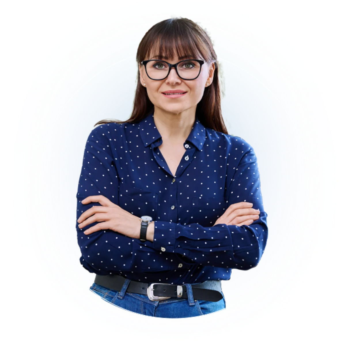 Person in navy blue polka dot blazer with glasses and arms crossed against white background