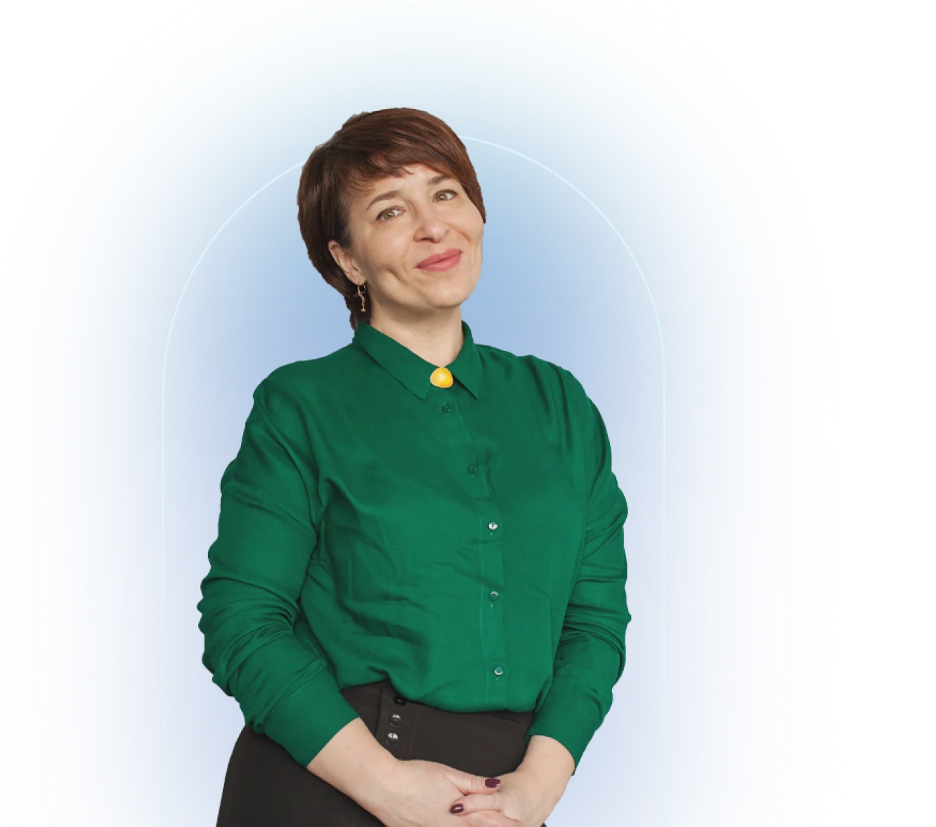 Person in emerald green button-up shirt against white background