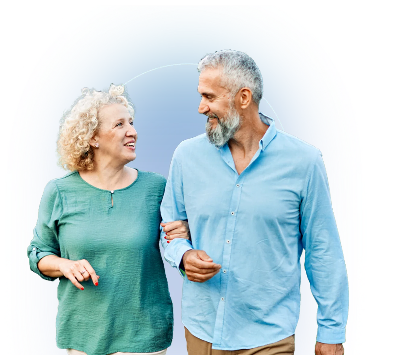 Two people walk together outdoors, one in teal top, one in light blue polo shirt